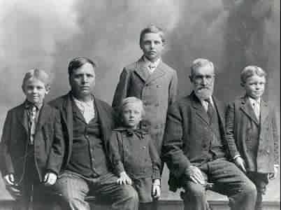 John Glue Harrison with his father and sons.